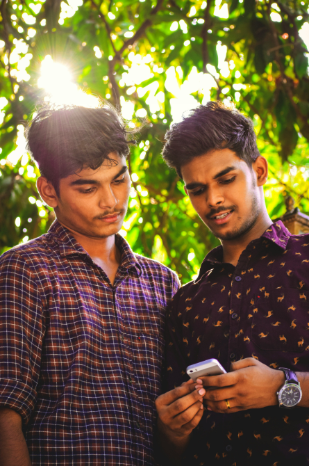 Friends posing on campus